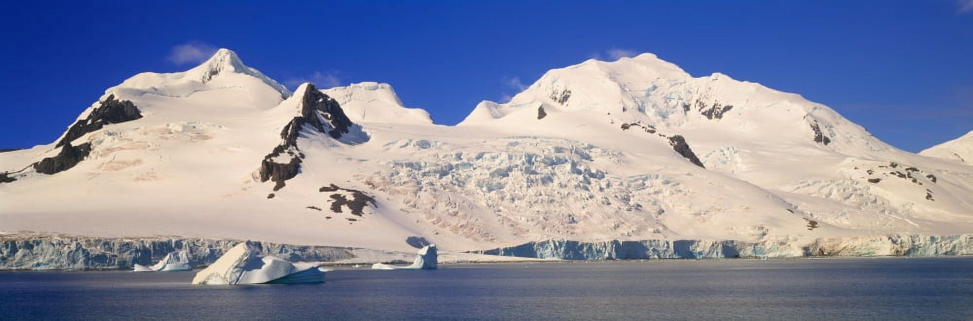 Panoramic view of glaciers and iceberg in Paradise Harbor Antarctica Canvas Art - Panoramic Images (36 x 12)