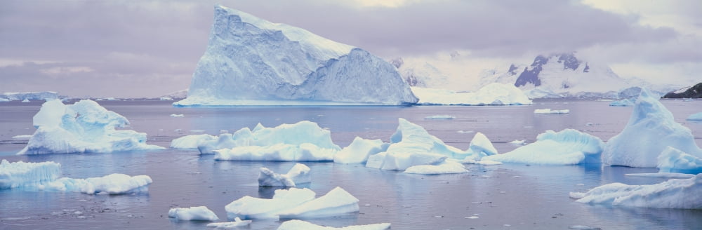 Panoramic view of glaciers and icebergs in Paradise Harbor Antarctica Canvas Art - Panoramic Images (36 x 12)