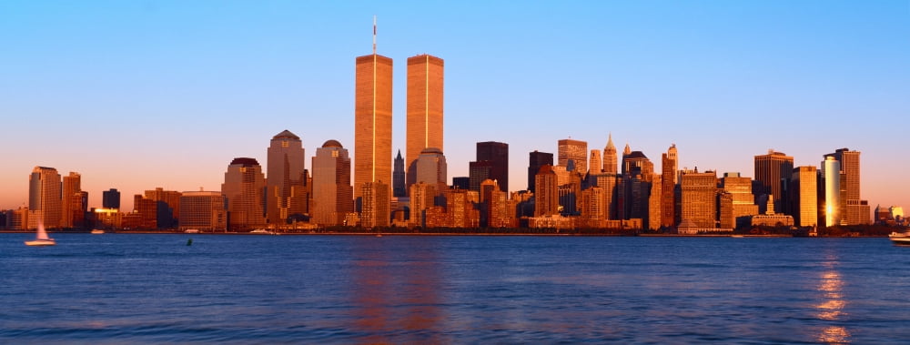 Panoramic view of lower Manhattan and Hudson River New York City skyline NY with World Trade Towers at sunset Canvas Art - Panoramic Images (36 x 12)