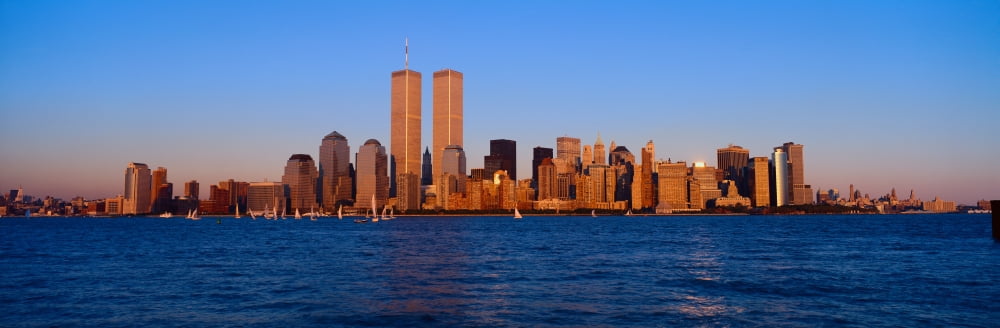 Panoramic view of lower Manhattan and Hudson River New York City skyline NY with World Trade Towers at sunset Canvas Art - Panoramic Images (36 x 12)