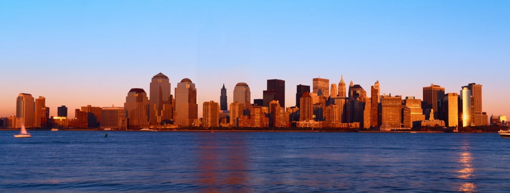 Panoramic view of lower Manhattan and Hudson River New York City skyline at sunset Canvas Art - Panoramic Images (36 x 12)