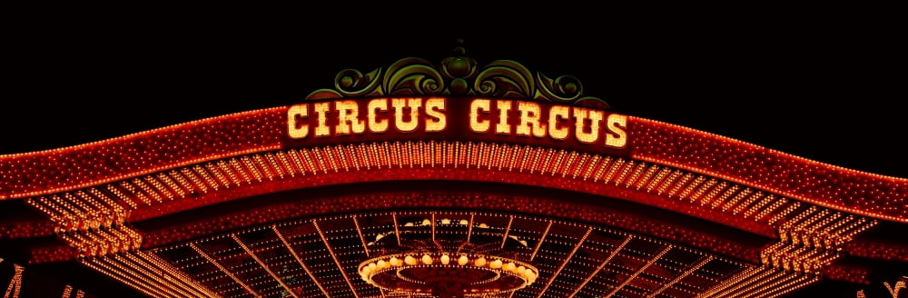 Panoramic view of neon lights of Circus Circus Casino Las Vegas NV Canvas Art - Panoramic Images (36 x 12)