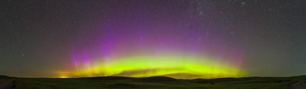 Panoramic view of northern lights on the horizon Saskatchewan Canada Canvas Art - Alan DyerStocktrek Images (52 x 15)