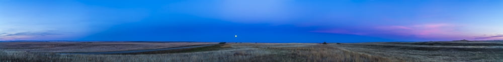 Panoramic view of the Harvest Moon rising after sunset Alberta Canada Canvas Art - Alan DyerStocktrek Images (80 x 10)