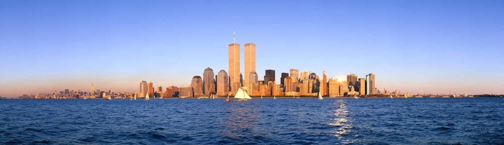 Panoramic view of sailboat on the Hudson River lower Manhattan and New York City skyline NY with World Trade Towers at sunset Canvas Art - Panoramic Images (36 x 12)