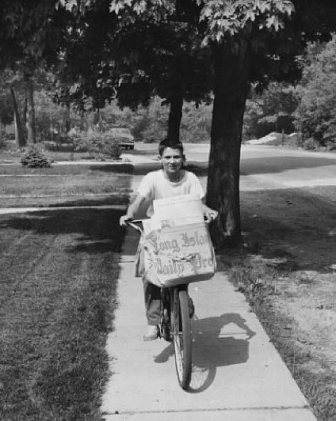 Paperboy delivering newspapers on a bicycle Canvas Art - (24 x 36)