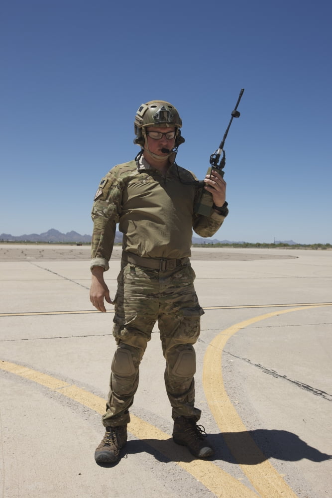 Pararescuemen conducts a communications check with his Sat radio Canvas Art - Terry MooreStocktrek Images (12 x 18)