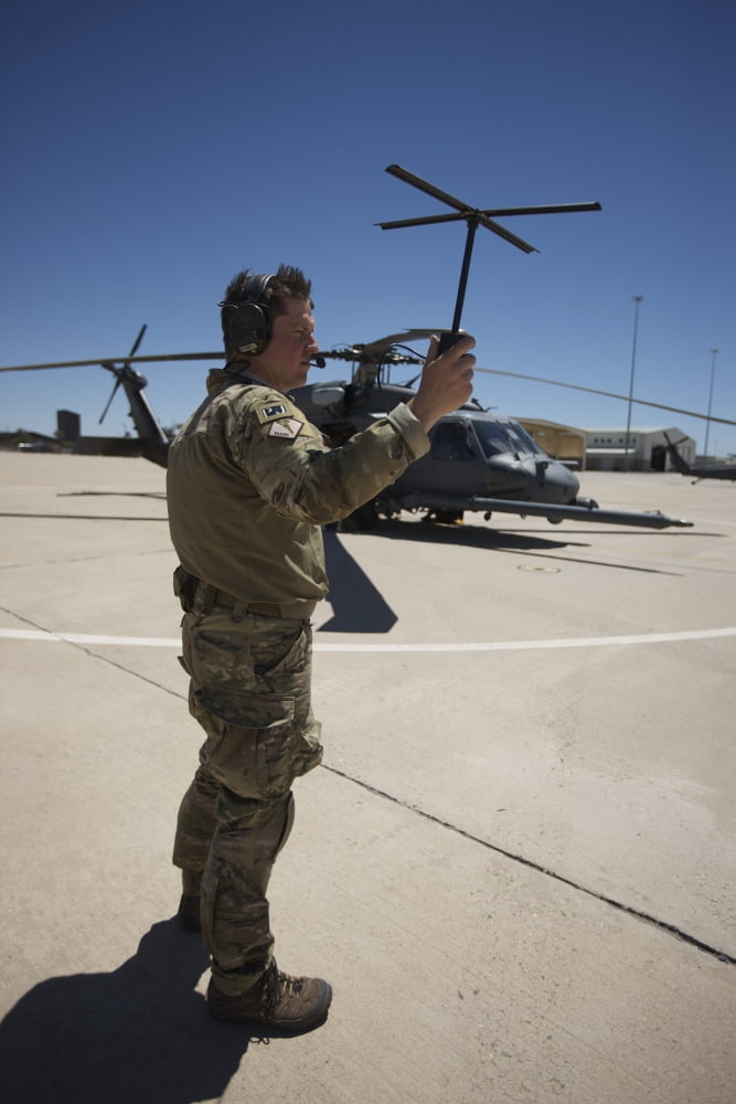 Pararescuemen conducts a communications check with his Sat radio Canvas Art - Terry MooreStocktrek Images (12 x 18)