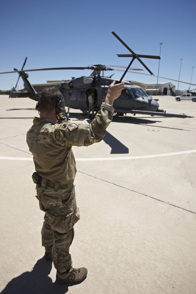 Pararescuemen conducts a communications check with his Sat radio Canvas Art - Terry MooreStocktrek Images (12 x 18)