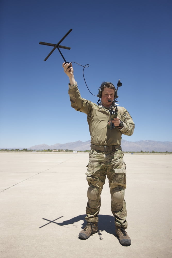 Pararescuemen conducts a communications check with his Sat radio Canvas Art - Terry MooreStocktrek Images (12 x 18)