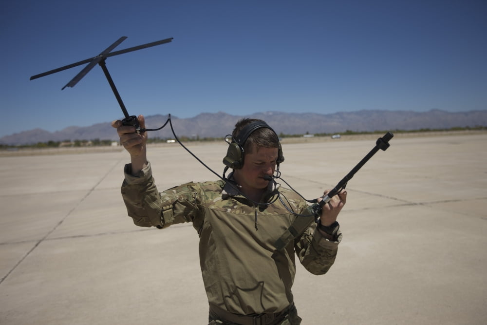 Pararescuemen conducts a communications check with his Sat radio Canvas Art - Terry MooreStocktrek Images (18 x 12)