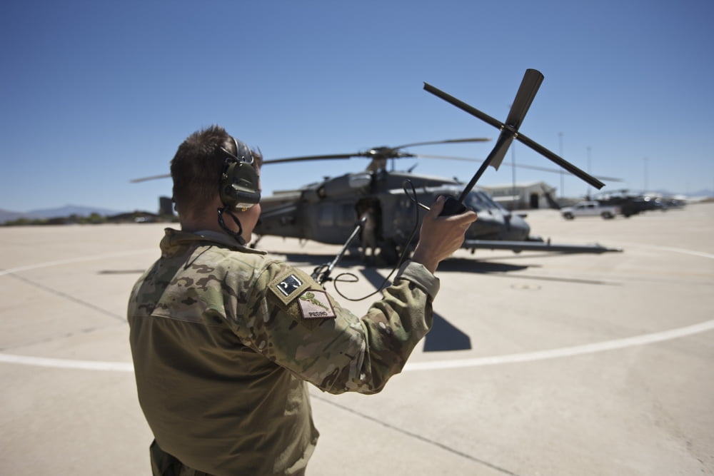 Pararescuemen conducts a communications check with his Sat radio Canvas Art - Terry MooreStocktrek Images (18 x 12)