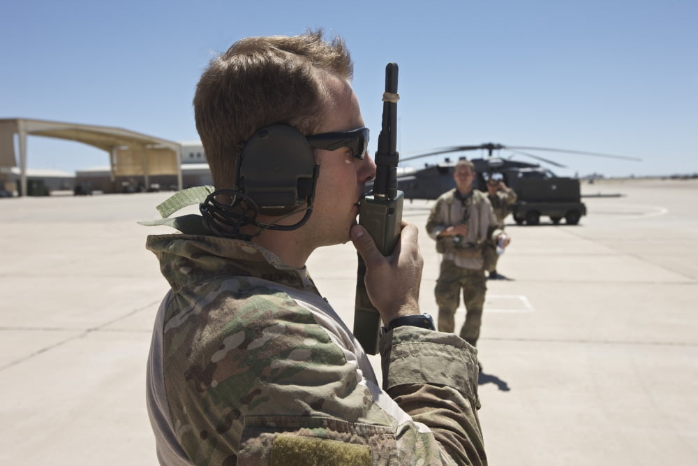 Pararescuemen conducts a communications check with his Sat radio Canvas Art - Terry MooreStocktrek Images (35 x 23)