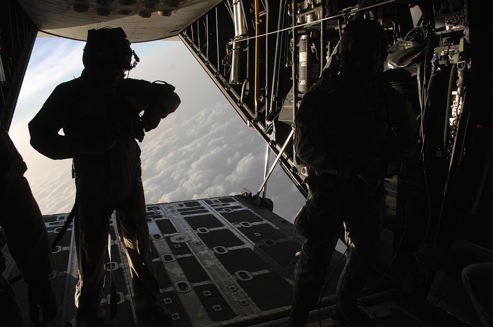 Pararescuemen prepare for a HALO jump aboard an HC-130 over Djibouti Canvas Art - Stocktrek Images (34 x 23)
