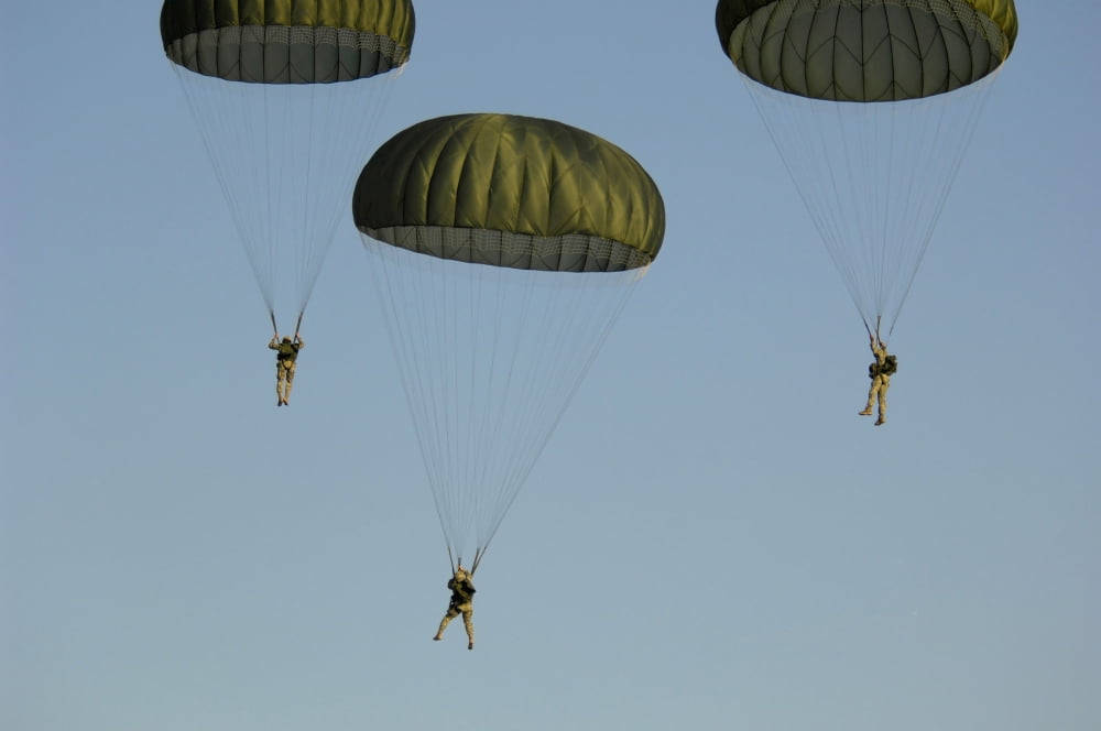 Paratroopers descend through the sky Canvas Art - Stocktrek Images (35 x 24)