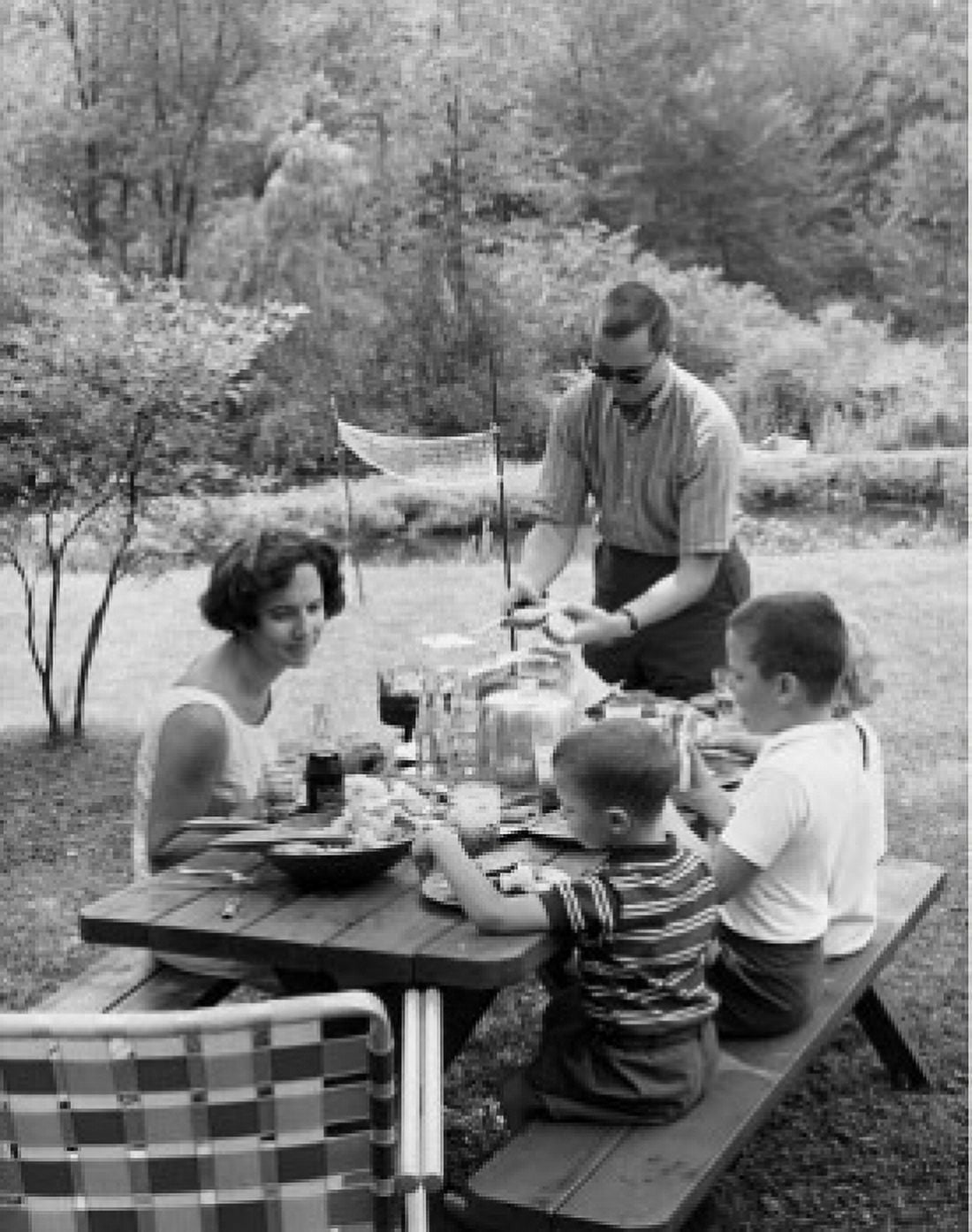 Parents and children having picnic Canvas Art - (24 x 36)