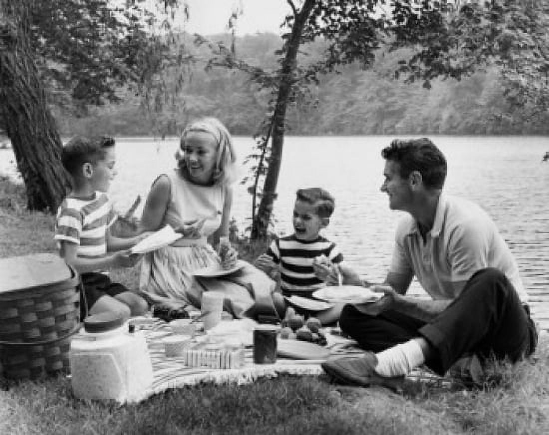Parents and children having picnic near lake Canvas Art - (24 x 36)