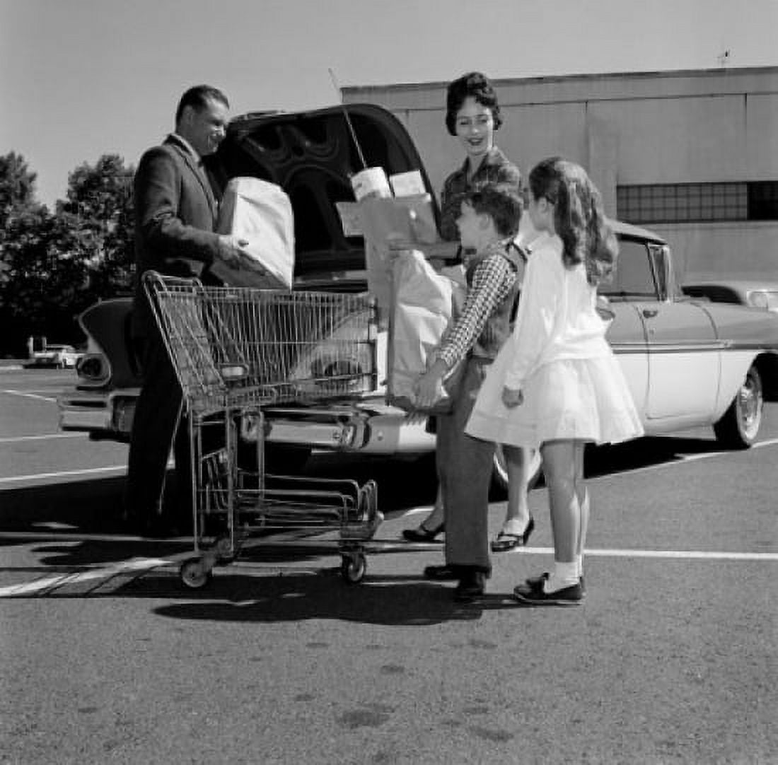 Parents and kids loading shopping bags into car trunk Canvas Art - (18 x 24)