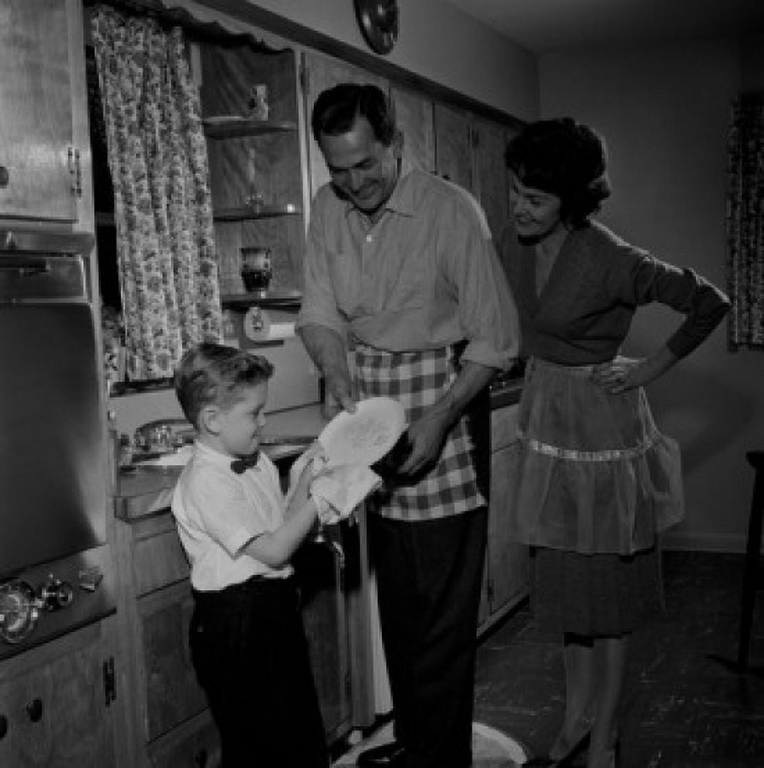 Parents and son washing dishes Canvas Art - (18 x 24)