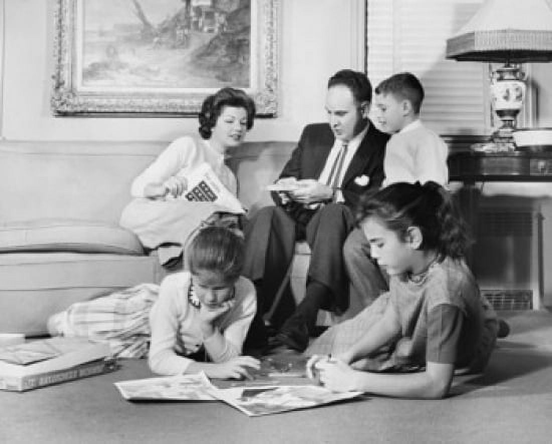 Parents and their children sitting in the living room Canvas Art -  (18 x 24)