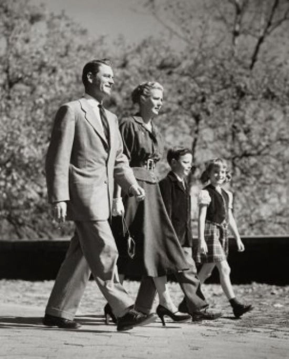 Parents and their children walking in a row Canvas Art - (18 x 24)