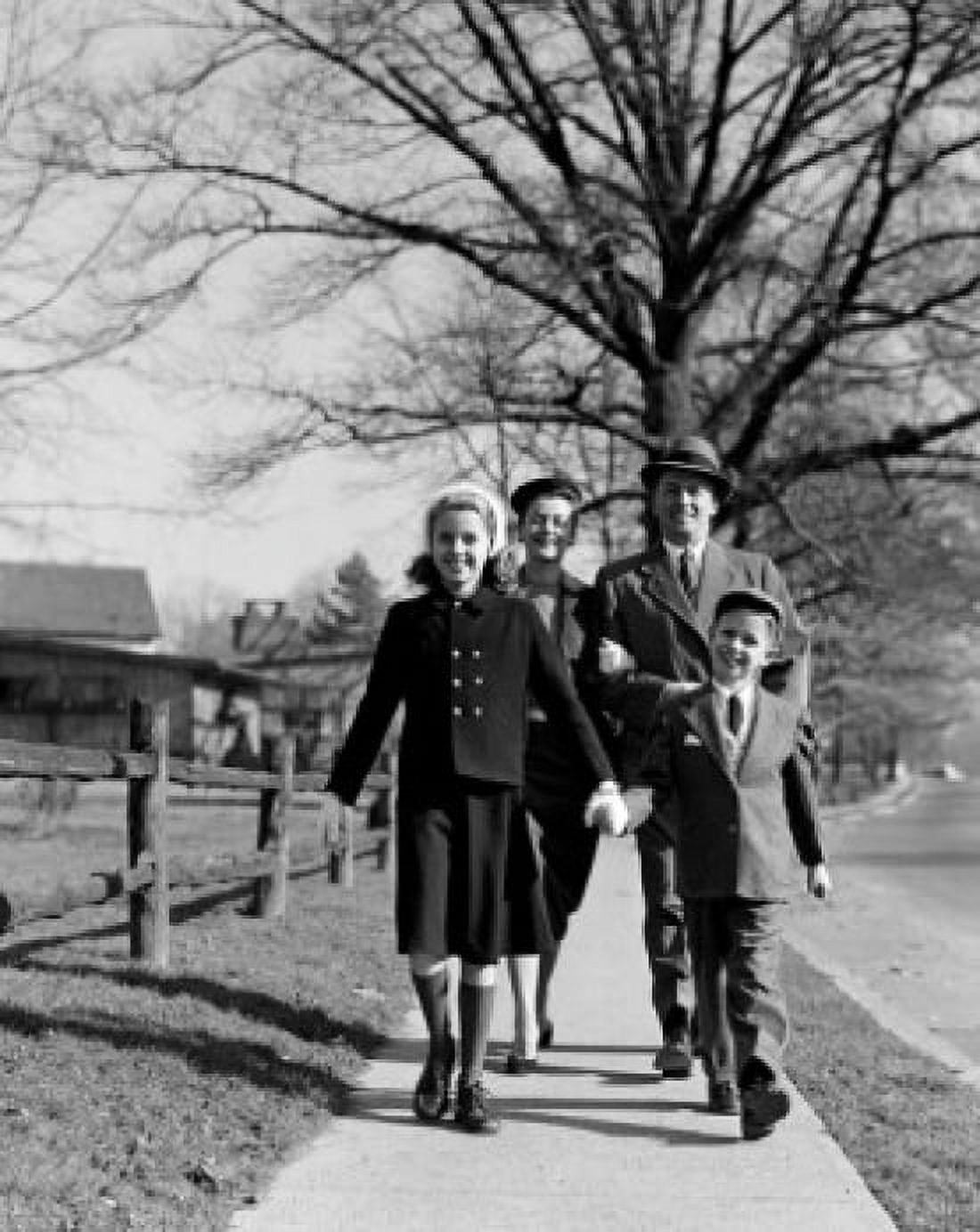 Parents with children on sidewalk Canvas Art - (24 x 36)