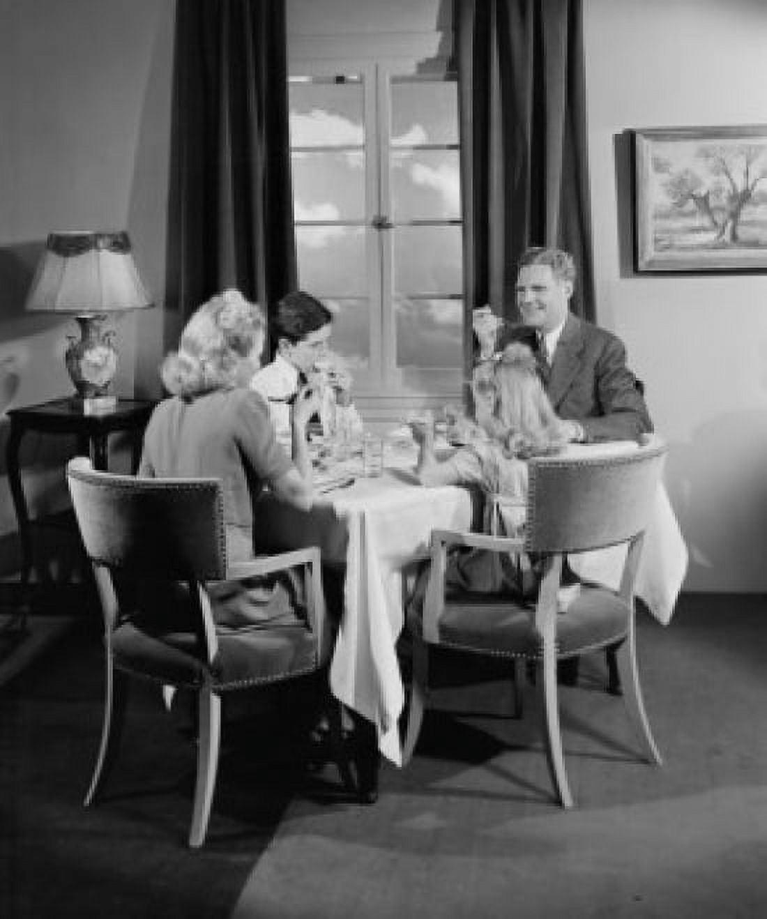 Parents with kids eating dinner at home Canvas Art - (24 x 36)