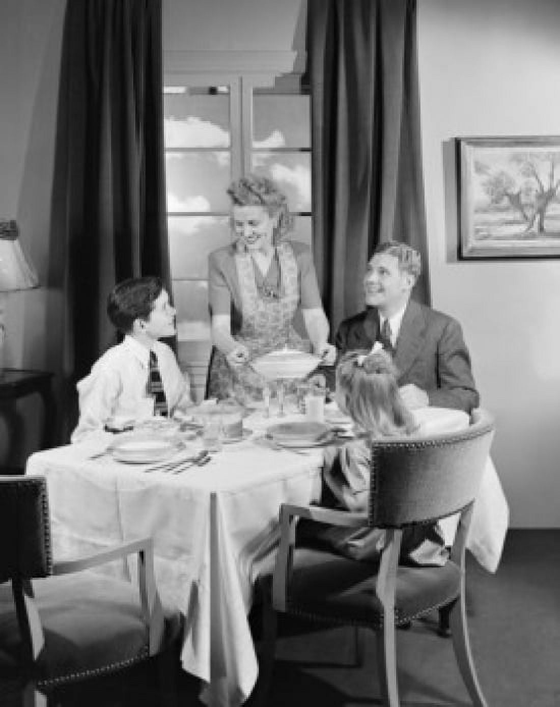 Parents with kids eating dinner at home Canvas Art - (24 x 36)