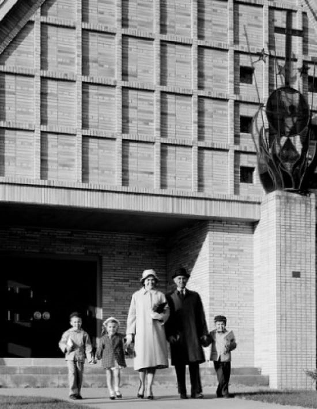 Parents with kids leaving church Canvas Art - (24 x 36)