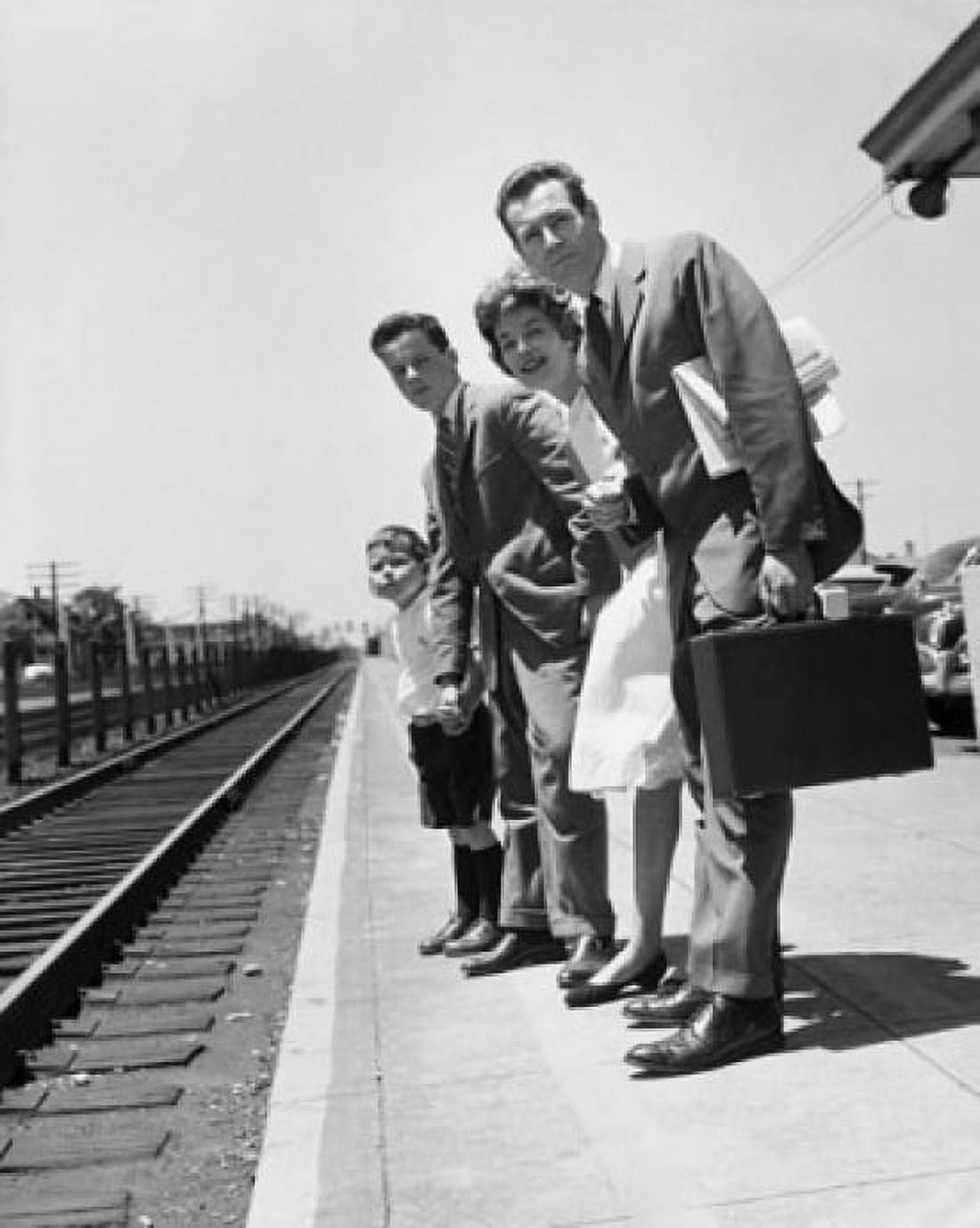 Parents with their children standing on a railroad station platform Canvas Art - (18 x 24)