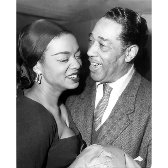 Paris American Jazz Band Leader Duke Ellington Chats With Pianist-Singer Hazel Scott At A Reception Given In His Honor At The American Cultural Center In Paris. The Duke Is Currently Giging A Series