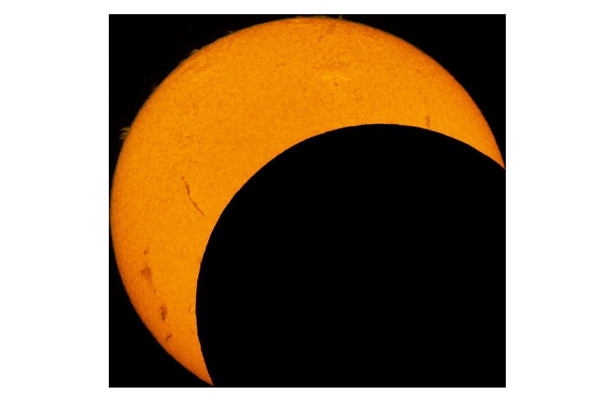 Partial solar eclipse of 2012 Canvas Art - Phillip JonesStocktrek Images (35 x 23)