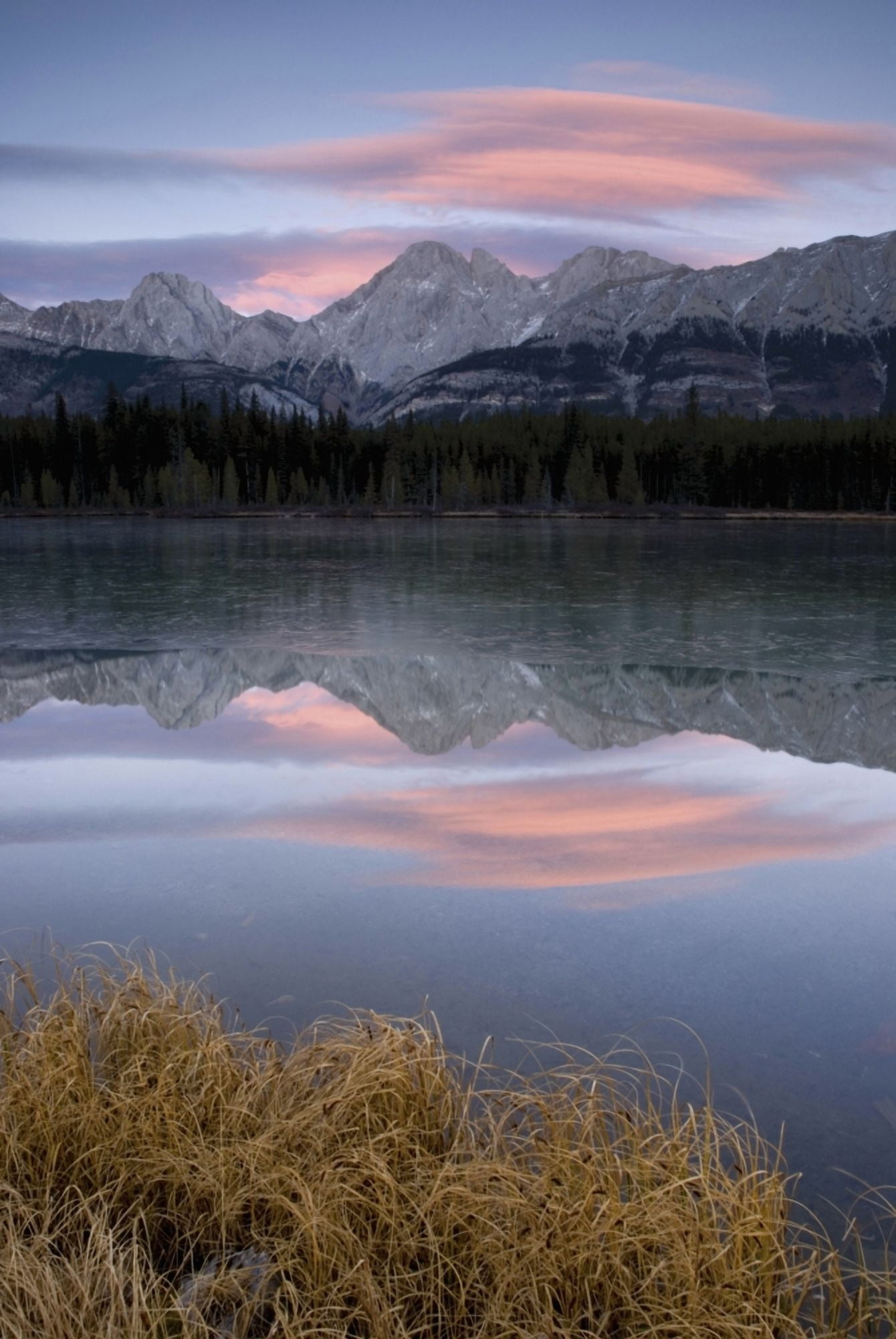 Partially Frozen Spillway Lake At Sunset Kananaskis Alberta Canada Canvas Art - Philippe Widling Design Pics (24 x 38)
