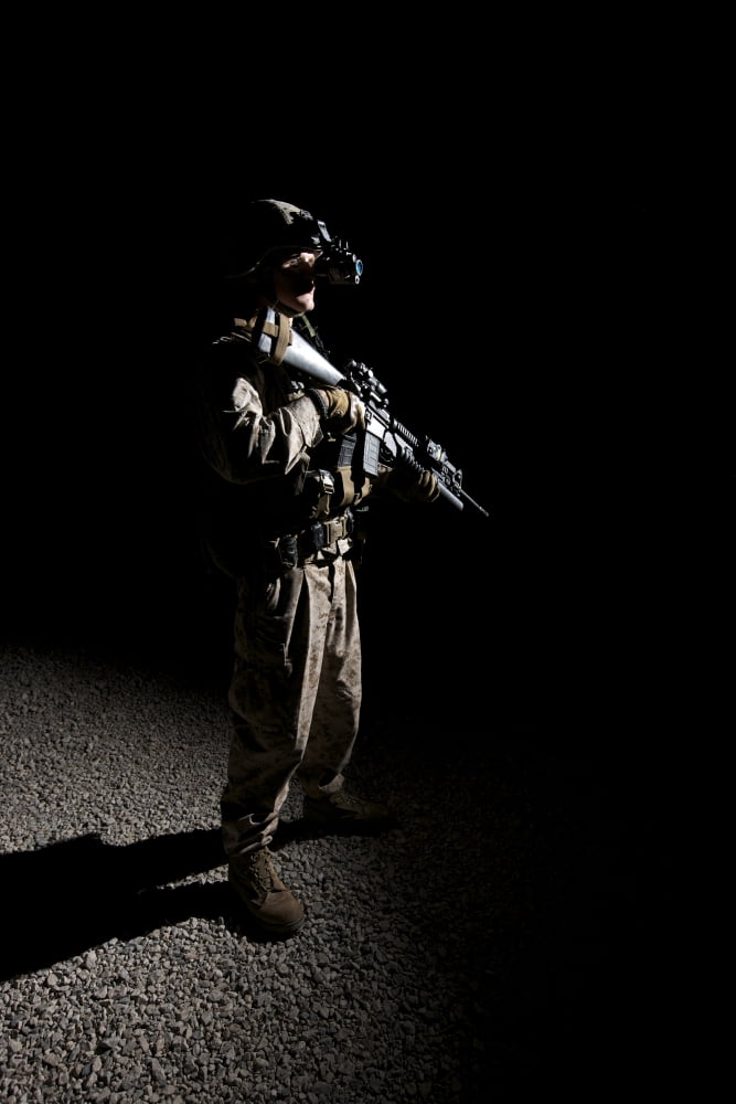 Partially silhouetted US Marine in Afghanistan Canvas Art - Terry MooreStocktrek Images (24 x 35)
