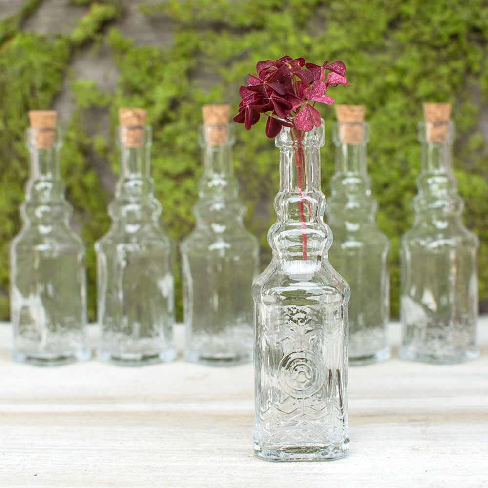 5 outlets Vintage glass apothecary bottles.