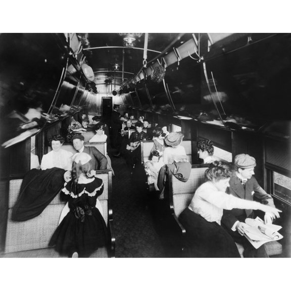 Passengers In An American Pullman Railroad Car In 1905. At The Car'S Rear Are Two African American Pullman Porters.