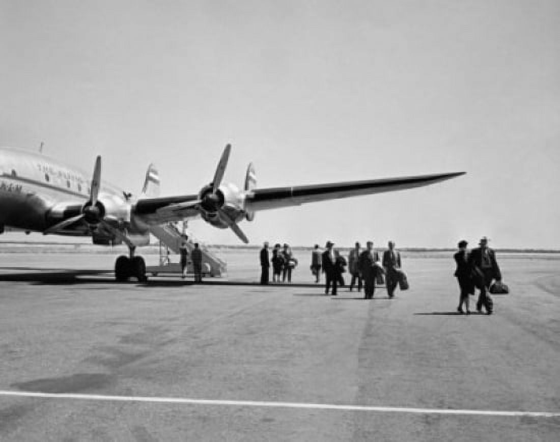 Passengers disembarking from an airplane Canvas Art - (18 x 24)