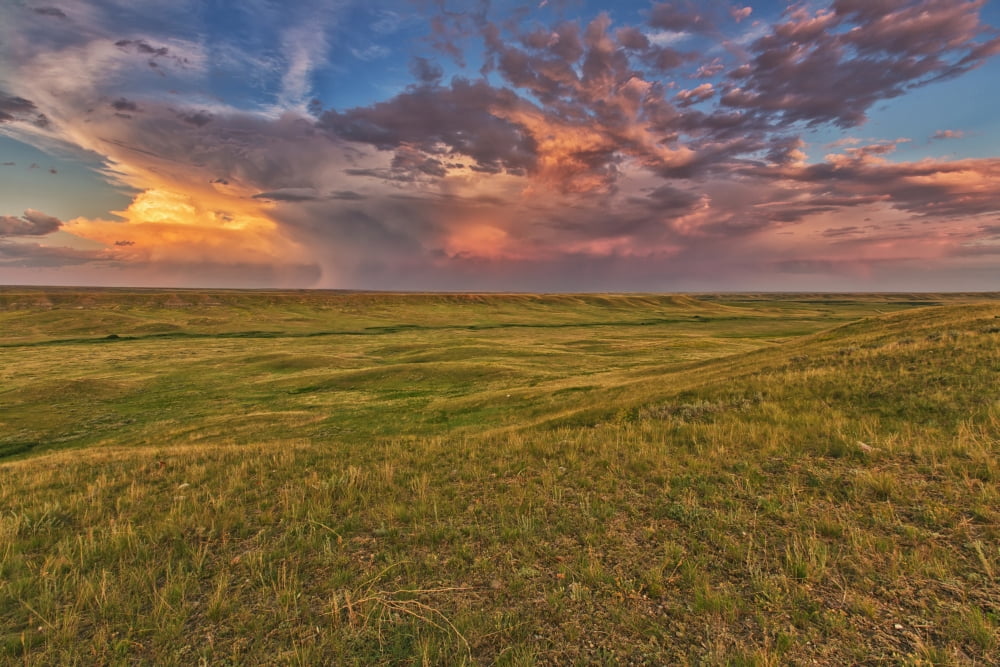 Passing Storm Over The Prairies In Grasslands National ParkSaskatchewan Canada Canvas Art - Robert Postma Design Pics (38 x 24)
