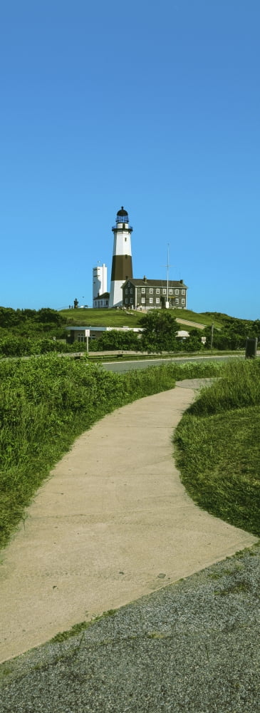 Pathway leading towards a lighthouse Montauk Point Montauk Suffolk County New York State USA Canvas Art - Panoramic Images (36 x 12)