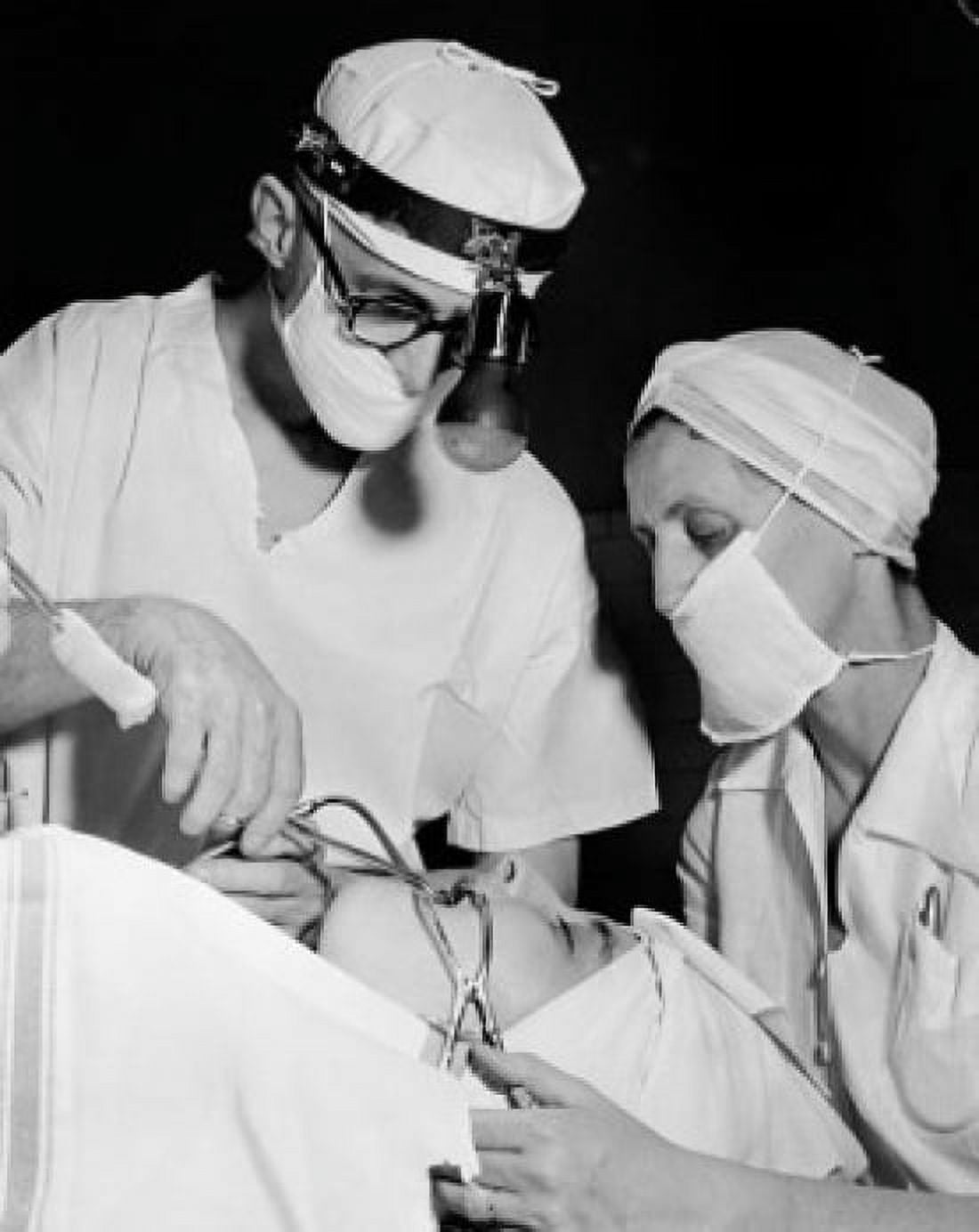 Patient getting treatment from two oral surgeons Canvas Art - (24 x 36)