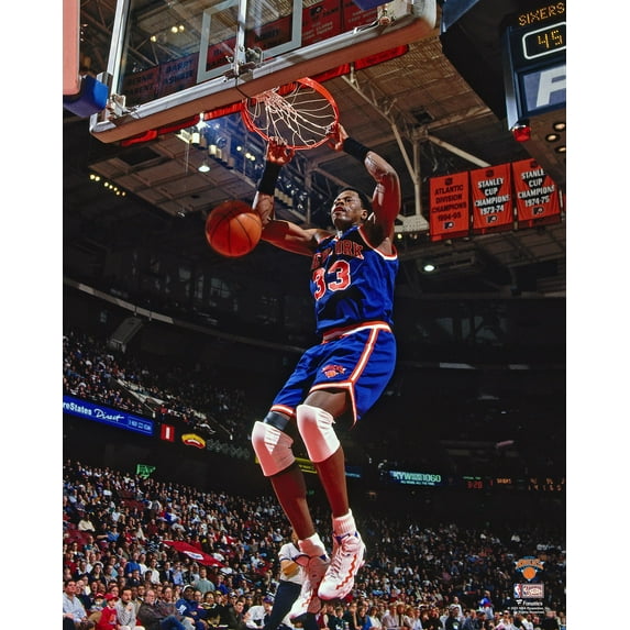 Patrick Ewing New York Knicks Unsigned Blue Jersey Two Handed Slam Dunk vs. Philadelphia 76ers Photograph