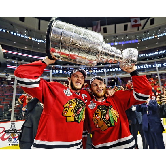 Patrick Kane & Jonathan Toews Chicago Blackhawks Unsigned 2015 Stanley Cup Champions Raising Cup Photograph