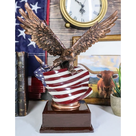 Patriotic Bald Eagle With Spread Out Wings Clutching On American Flag Statue