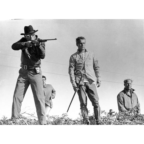 Paul Newman Practicing Rifle in Formal Outfit Black and White Photo Print (8 x 10)