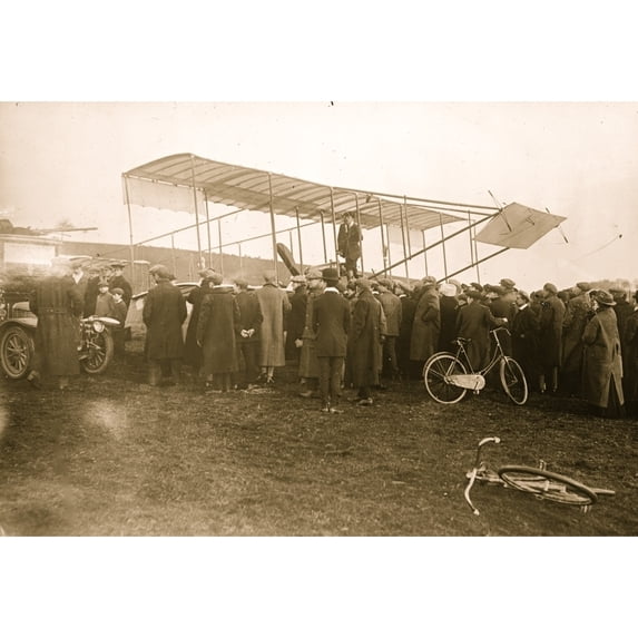 Paulham's aeroplane surrounded by a crowd Poster Print (24 x 36)
