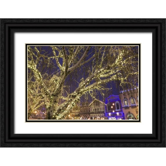 Paulson, Don 32x23 Black Ornate Wood Framed with Double Matting Museum Art Print Titled - WA, Leavenworth Christmas lights line the town