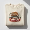 thumbnail image 1 of Paws & Pages Embroidered Sweatshirt, Christmas Cat Reader Sweater, Holiday Bookish Feline Gift, Cat Mom Crewneck, 1 of 4