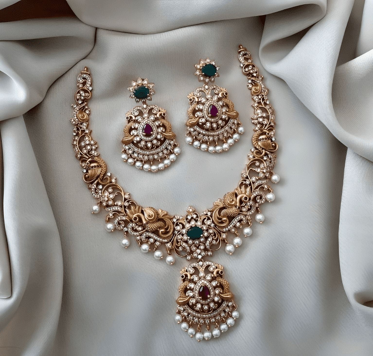 Peacock Matte Gold Finish Bridal Necklace & Jhumka Earrings Set with AD Ruby Green Kemp Stones - South Indian Antique Jewelry for Weddings