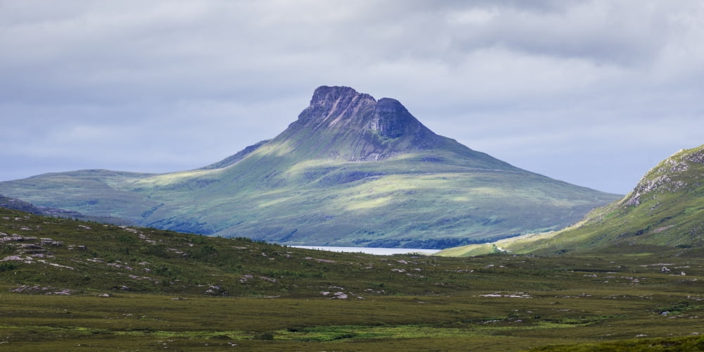 Peak of a mountain under a cloudy sky in the Highlands Scotland Canvas Art - Keith Levit Design Pics (22 x 11)