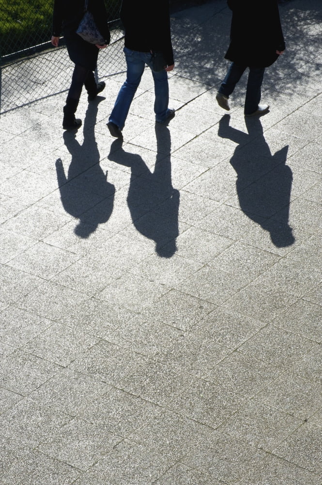 Pedestrians and their shadows on a walkway Paris France Canvas Art - Ingrid Rasmussen Design Pics (12 x 19)